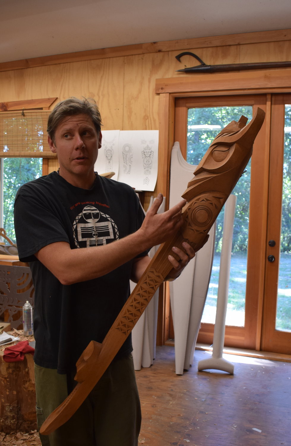 La Center woodworker Adam McIsaac shows off a decorative straight adze in his workshop Sept. 4