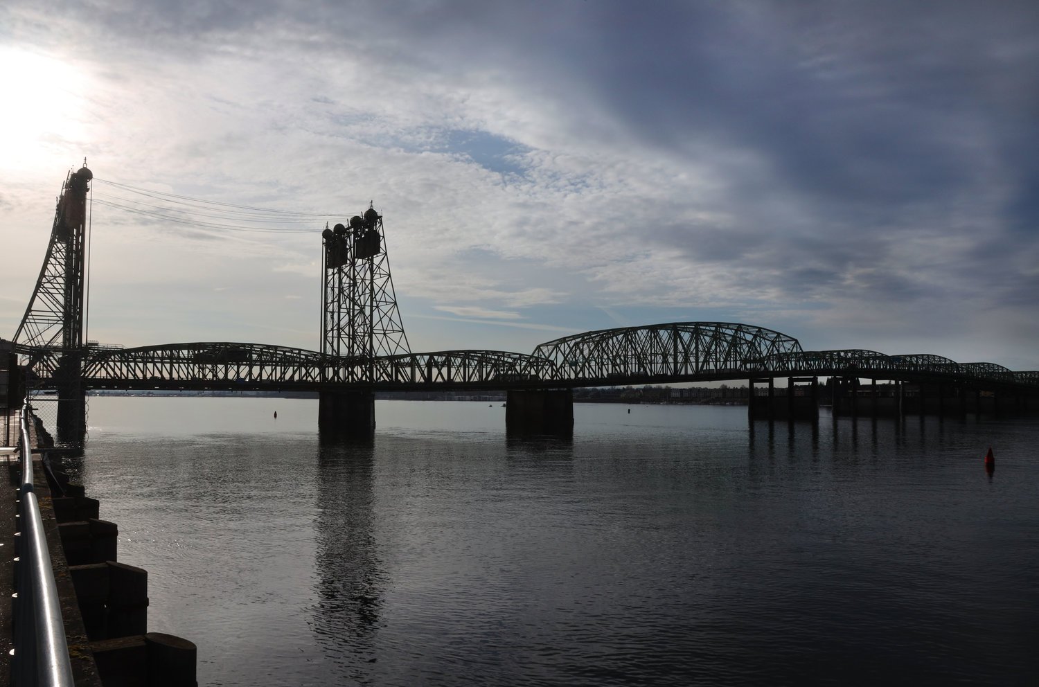 The Interstate 5 Bridge stretches across the Columbia River to Oregon on a cloudy morning in March 2019. 