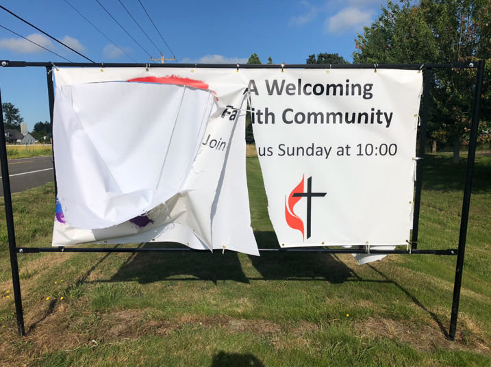 Vandalism of Battle Ground Community United Methodist Church’s “Welcoming Faith Community” banner discovered July 22. 