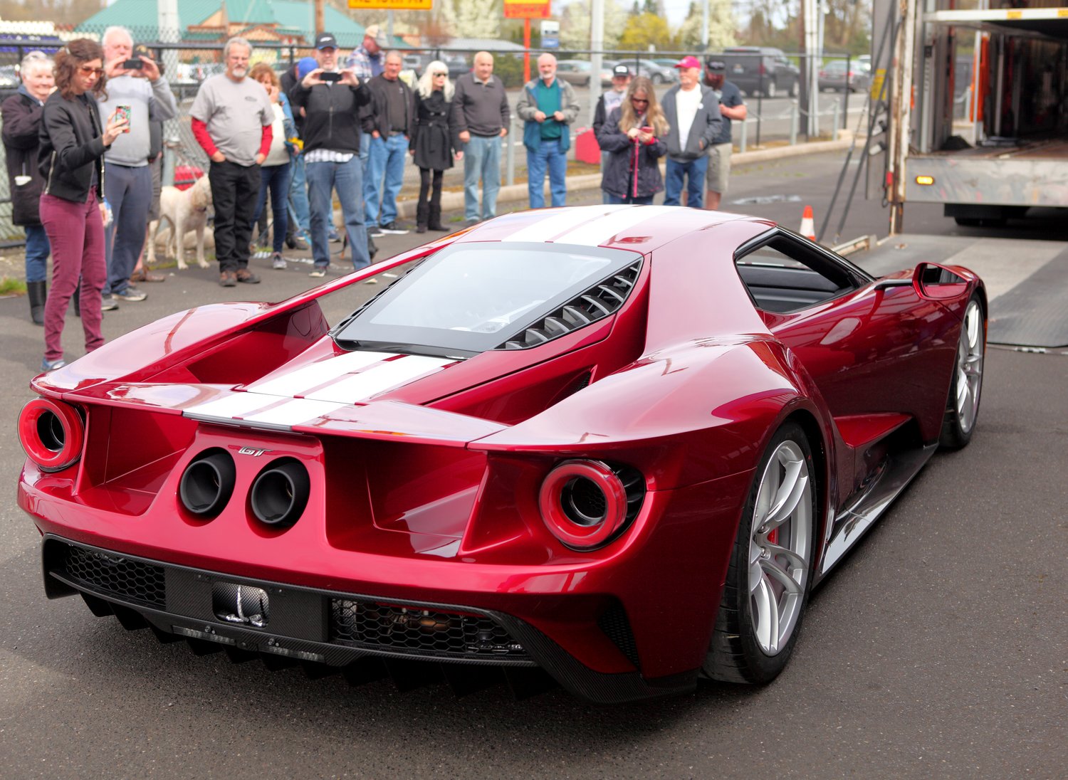 Car enthusiasts admire Ron Wade of Woodland’s 2019 Ford GT after it was dropped off earlier this year. 
