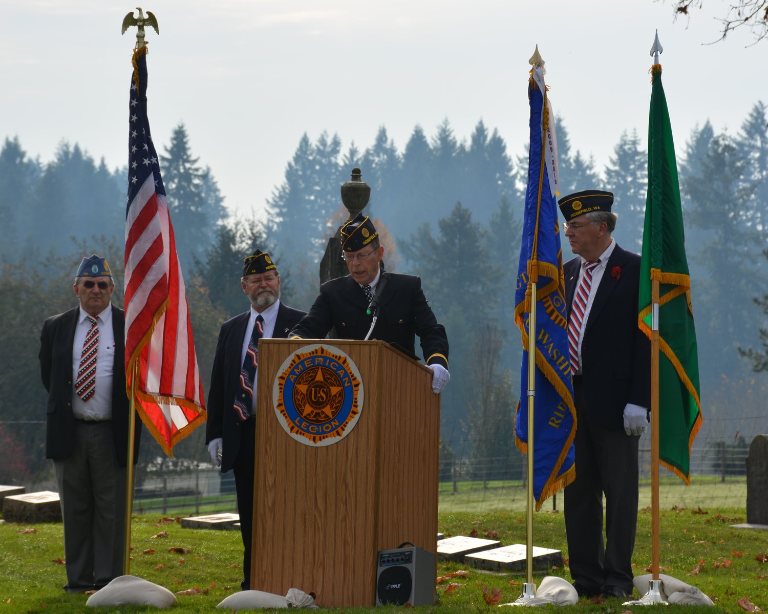 Members of the American Legion address a crowd gathered at a flagpole dedication ceremony at Sara Union Cemetery near Ridgefield on Veterans Day 2016.