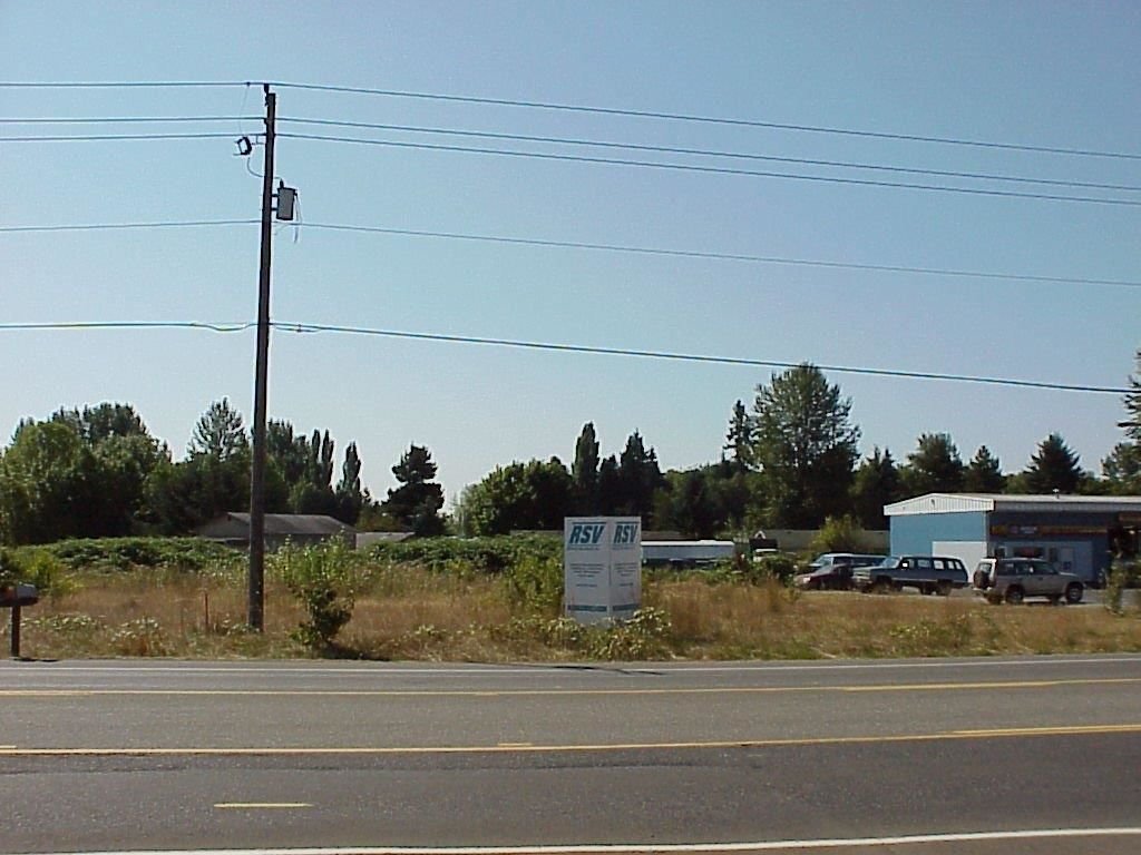 BEFORE: The vacant plot of land that would become Elite Collision Center circa 2002.
