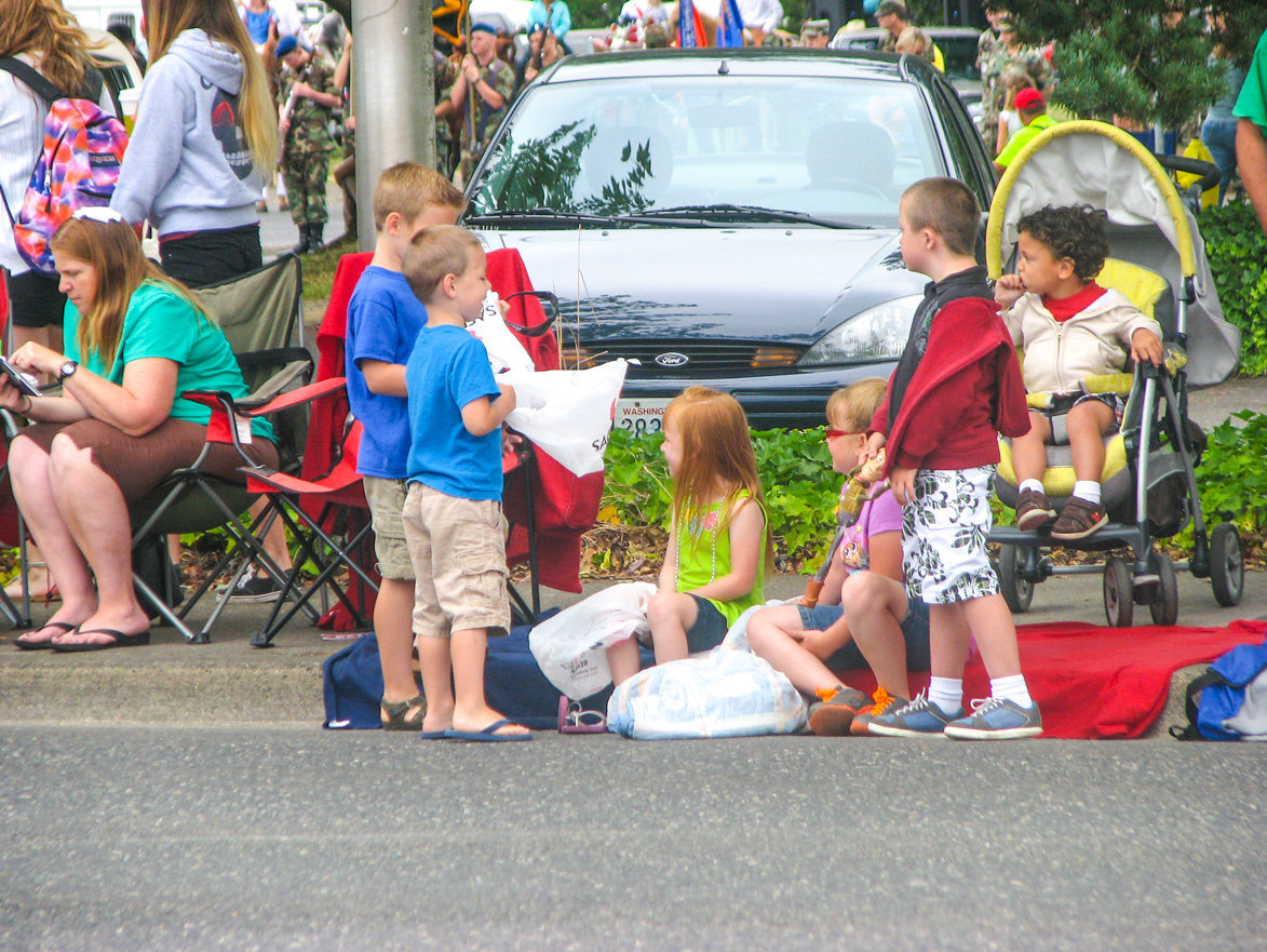 THE ANNUAL HARVEST Days Parade brings hundreds of spectators to line Main Street to catch a glimpse of their favorite float or to gather some candy that is often passed out to children in the crowd.