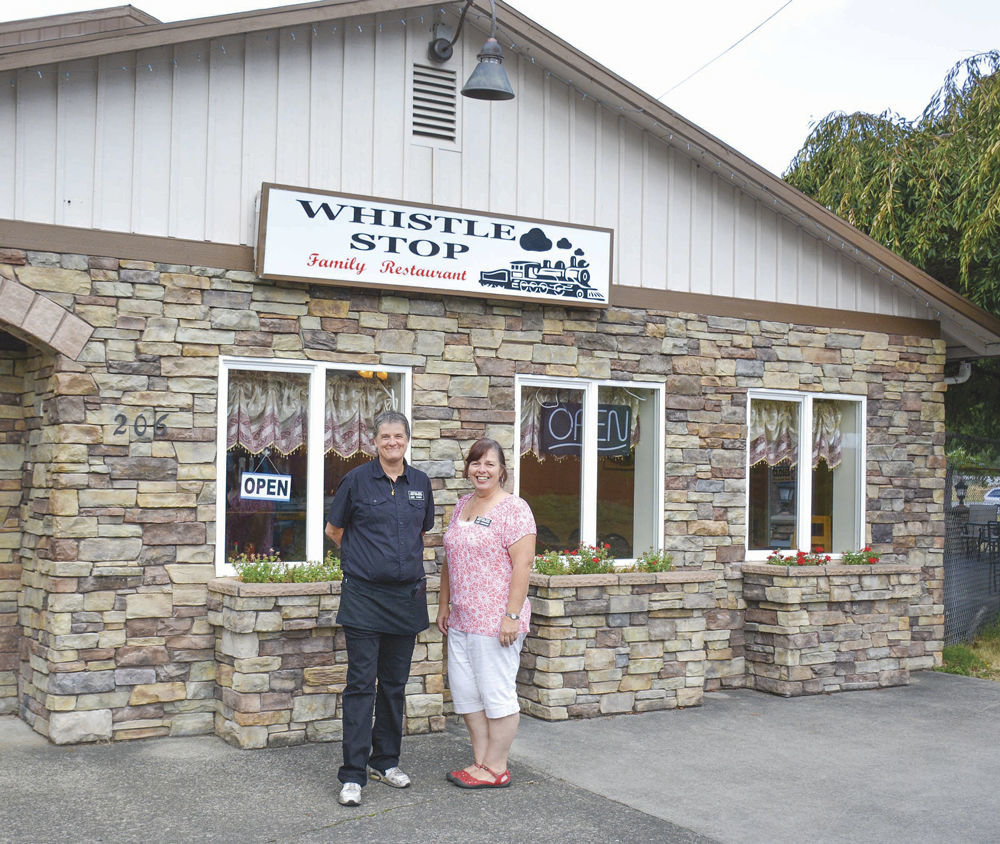 RESTAURANT AND SERVICE industry veterans Cathy Carr (left) and Cherrie Smith (right) stand outside their new business, the Whistle Stop Family Restaurant in Yacolt. Located at 206 North Railroad Ave., across from the Chelatchie Prairie Railroad terminal, the Whistle Stop is open from 7 a.m. to 8 p.m., Sunday through Thursday, and from 7 a.m. to 9 p.m. on Friday and Saturday. For more information, call (360) 686-0938.