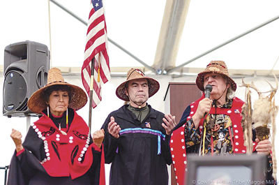 COWLITZ INDIAN TRIBE Chairman Bill Iyall (center) stands with two of his tribe’s spiritual elders Tanna Engdahl (left) and Roy Wilson (right) at a gathering on the tribe’s new reservation land near La Center in late December of 2014.