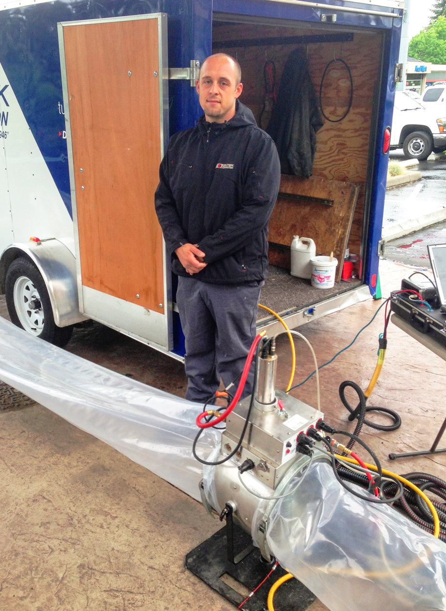ENTEK AEROSEAL TECHNICIAN Michael Davis shows the duct-sealing equipment. Entek, a company with offices in Longview and Vancouver, is one of the few to offer Aeroseal in southwest Washington and northwest Oregon.