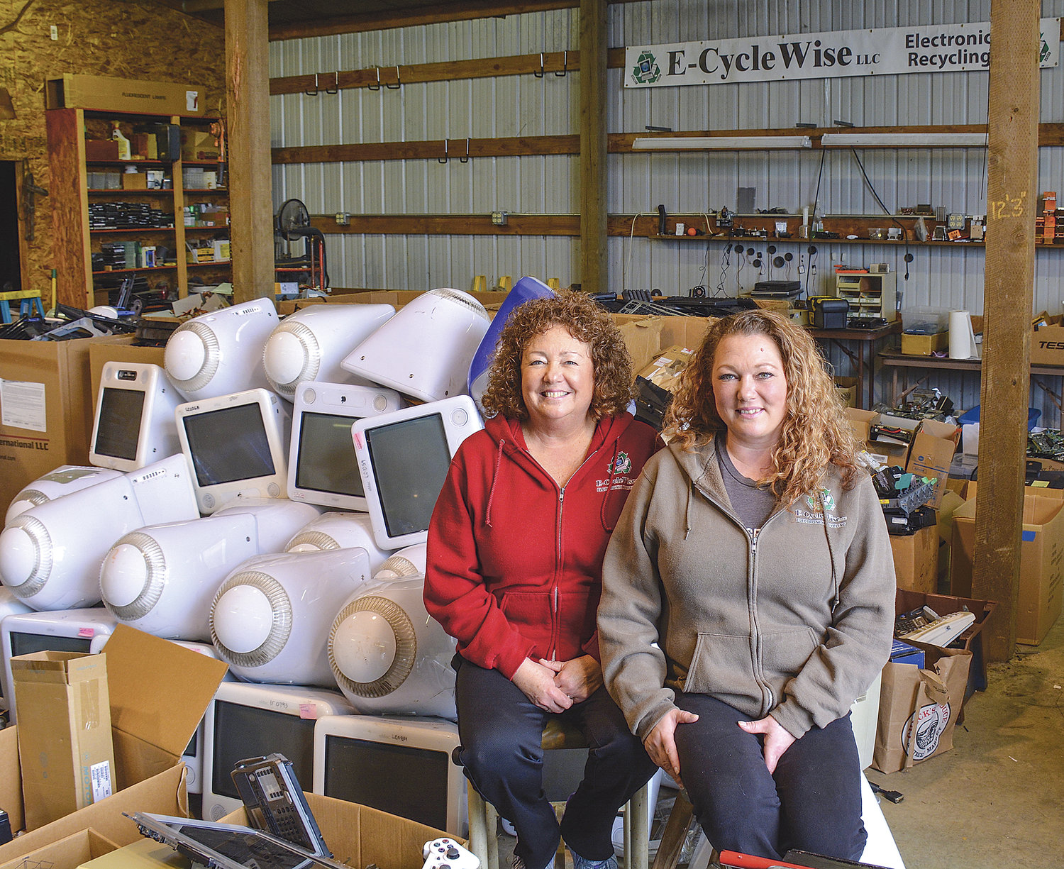THE MOTHER-DAUGHTER team of Rachel Treasure (left) and Eva Metcalfe is behind the La Center-based business, E-CycleWise, which offers free pickups, recycling and data destruction for individuals and businesses that want to get rid of their old electronic devices.