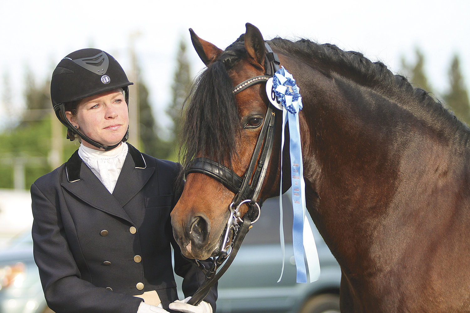 JESSICA WISDOM, of Battle Ground, stands next to her prize-winning pony, North Forks Cardi, a 13-year-old Welsh Cob stallion. Wisdom and Cardi are the only pony-rider combo in the highly competitive world of dressage.