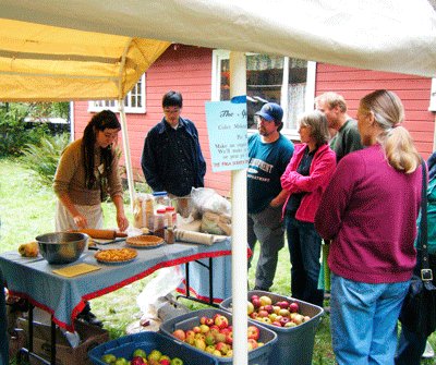 JAHNAVI HASTINGS shows attendees at the Heirloom Apple Festival how to make a good pie crust for an apple pie. The Sixth Annual Heirloom Apple Festival will be held this year Sun., Oct. 28, 11 a.m.-4 p.m., at the Historic Venersborg School House, 24317 NE 209th St., Battle Ground. Attendees can taste apples, get their apples identified, participate in cider pressing and more.