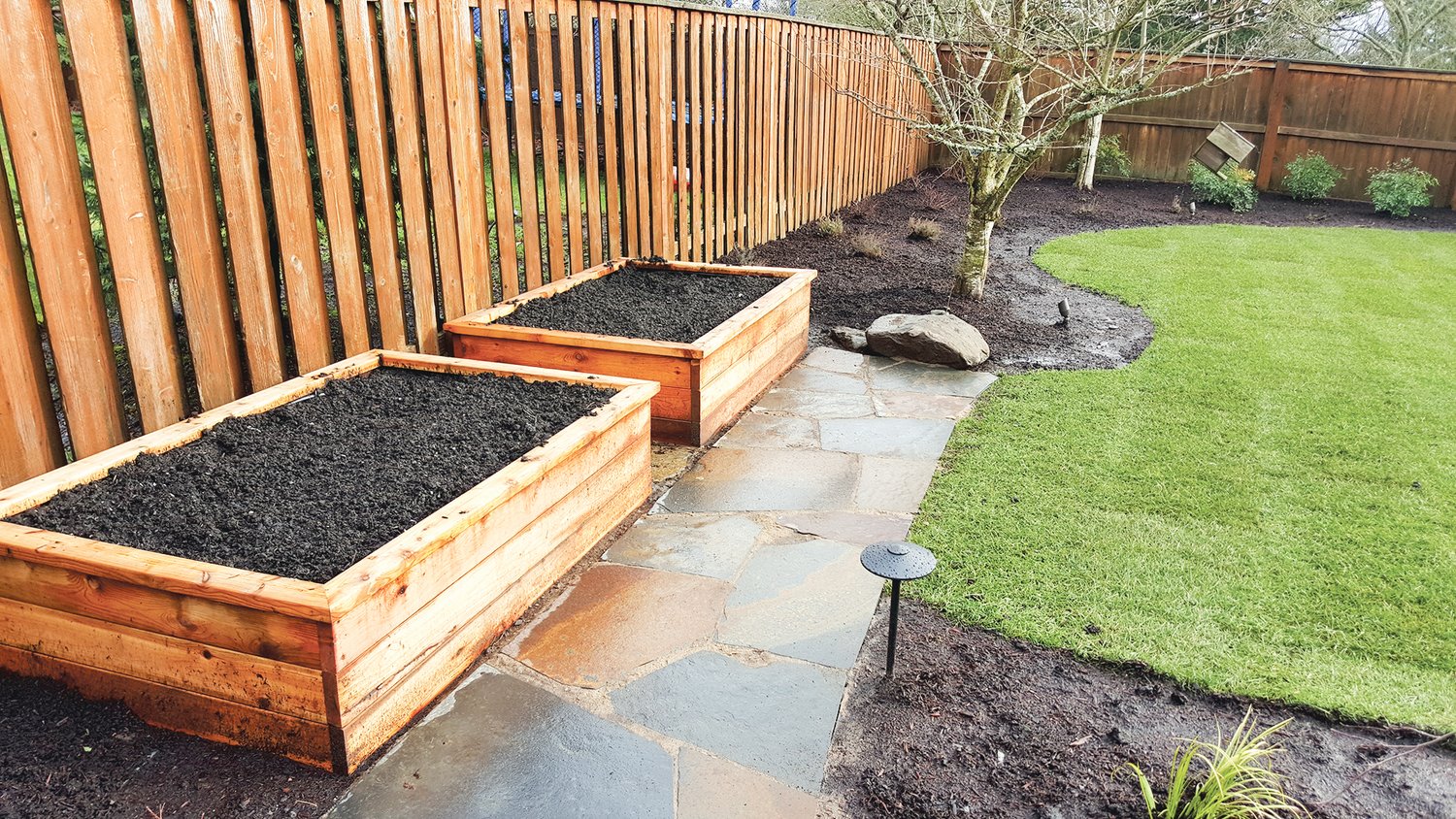 Gardening in raised beds is a popular feature in many backyards where berries, fruits and vegetables can be enjoyed. Boulder Falls Landscaping said this is a popular request by many of their clients who have small lots.