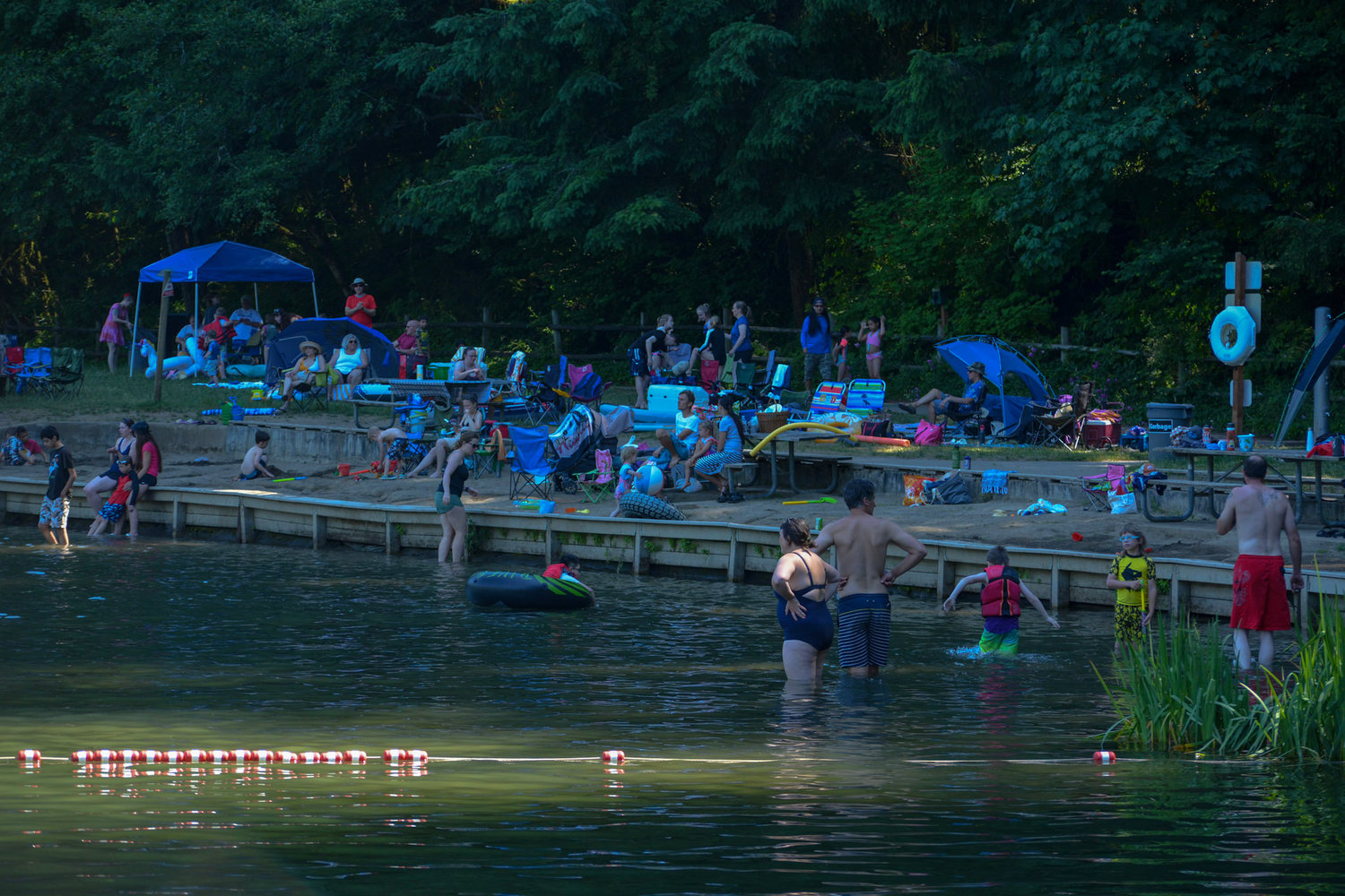 People filled the beach and swimming areas of Battle Ground Lake State Park during the heatwave on June 26.