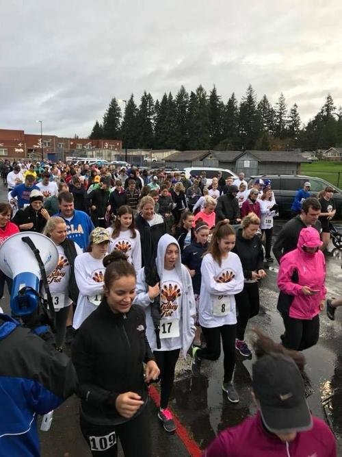Runners line up for the first Turkey Trot in 2017. This year, the run benefits two local organizations.