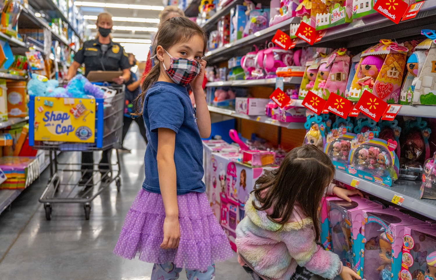 Officers from the Battle Ground Police Officers spent the morning of Dec. 4 helping 19 area kids shop for Christmas presents during the annual Shop with a Cop program.