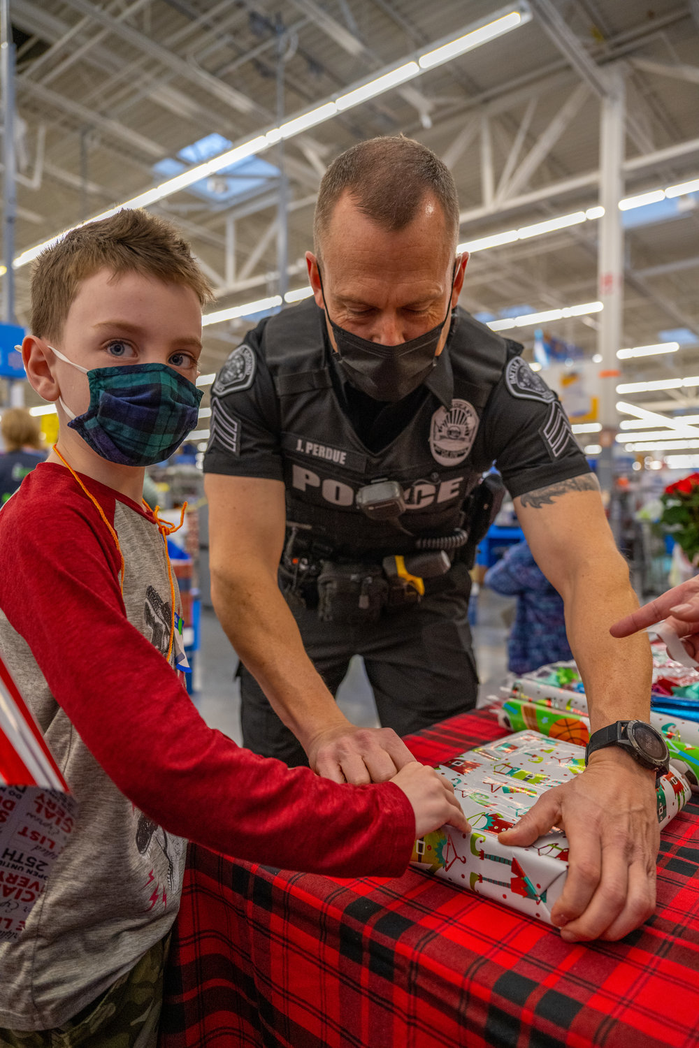 Officers from the Battle Ground Police Officers spent the morning of Dec. 4 helping 19 area kids shop for Christmas presents during the annual Shop with a Cop program.