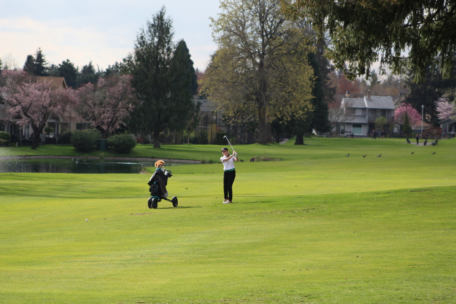 Khloe Rist puts the ball on the green during her game at Fairway Village in Hockinson.