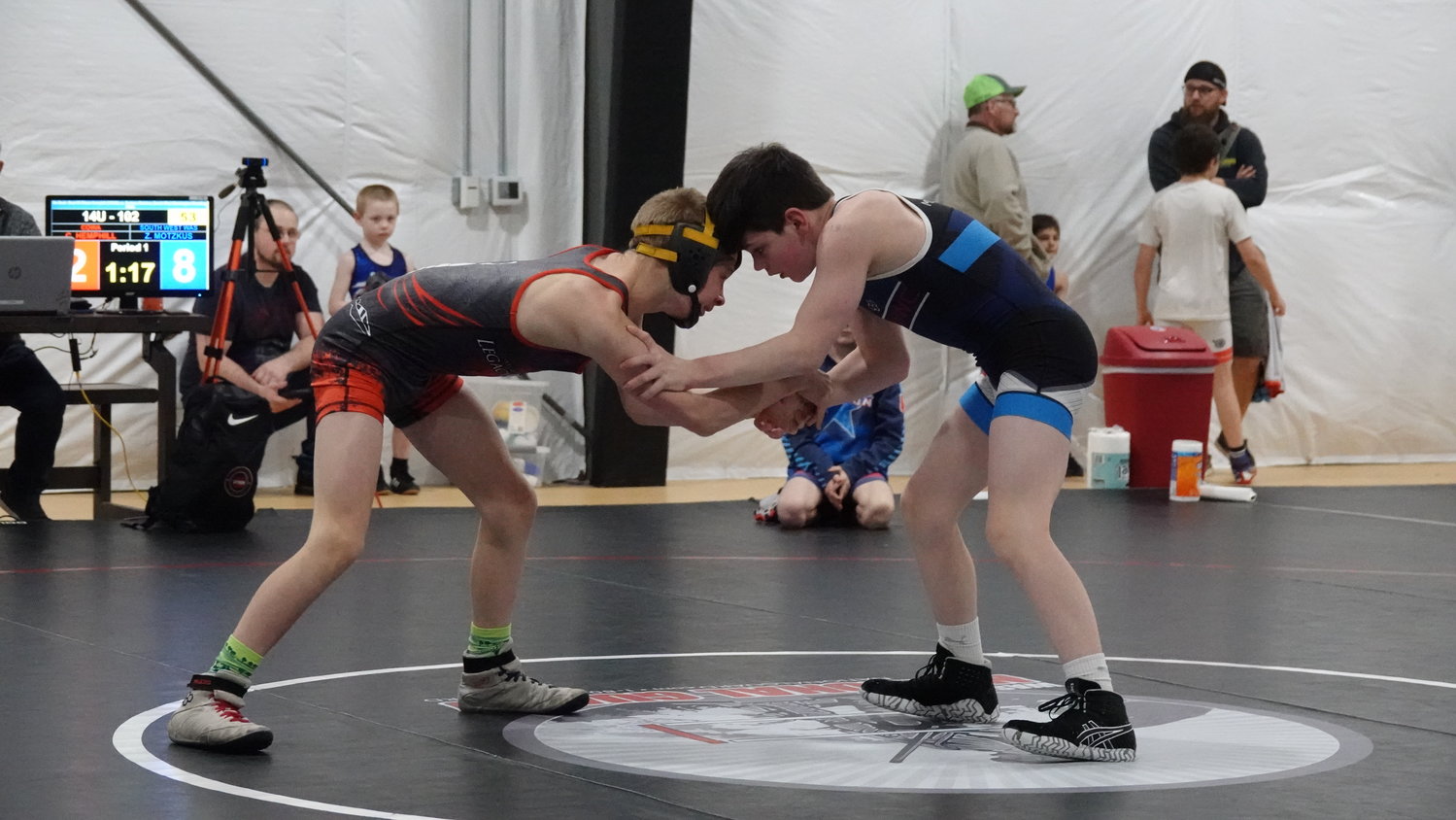 Seventh grader Zack Motzcas wrestles an opponent at the tournament on April 16.