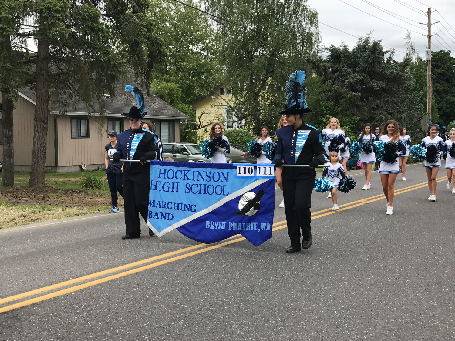 The Hockinson High School marching band and cheer team takes part in the Fun Days parade in 2019.