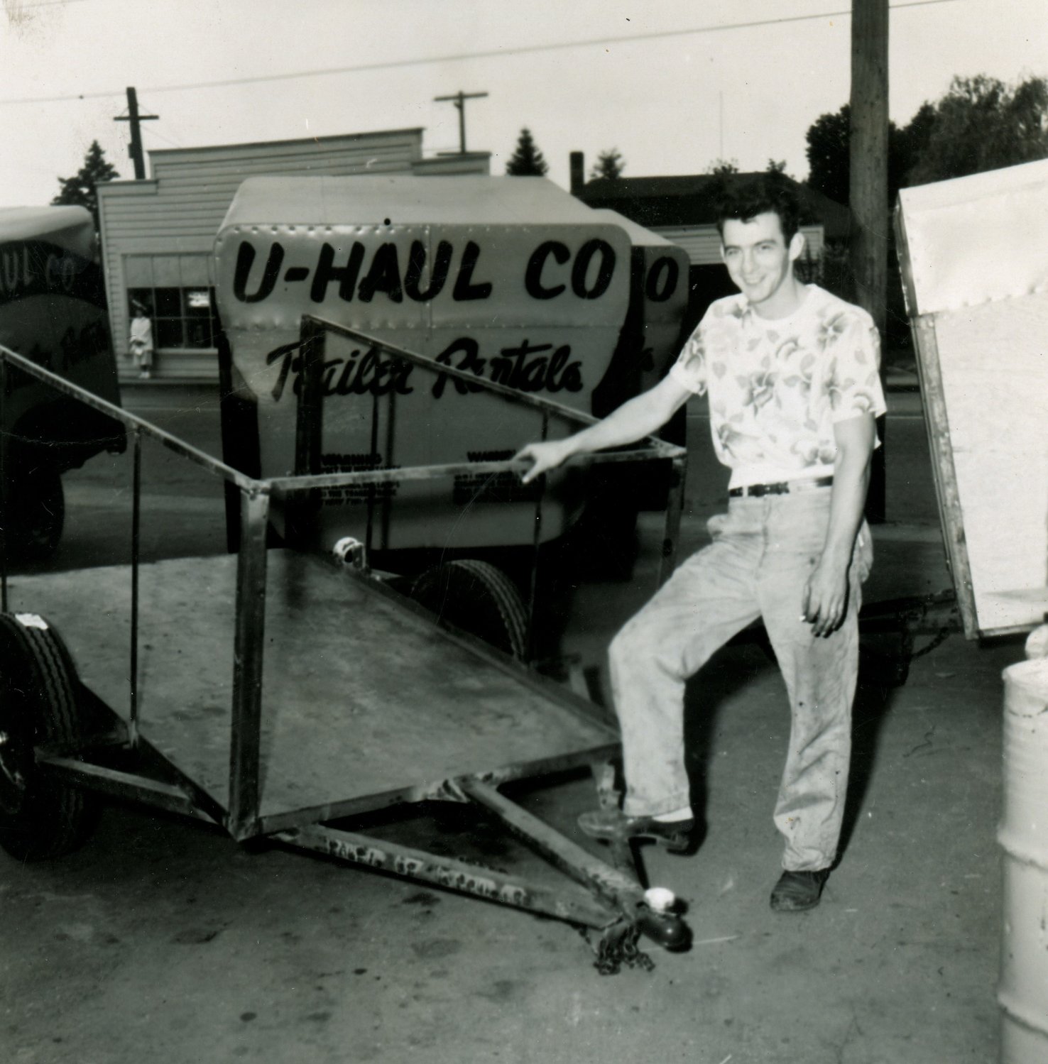Hap Carty, U-Haul’s first employee, stands by a trailer at the business’ Portland shop in 1948.