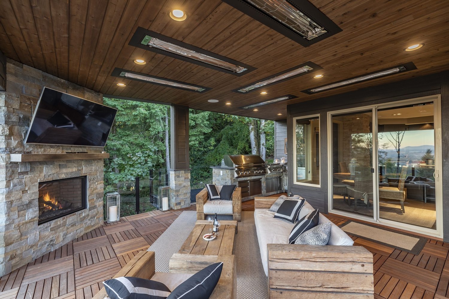A back patio with a fireplace GRO completed is pictured.