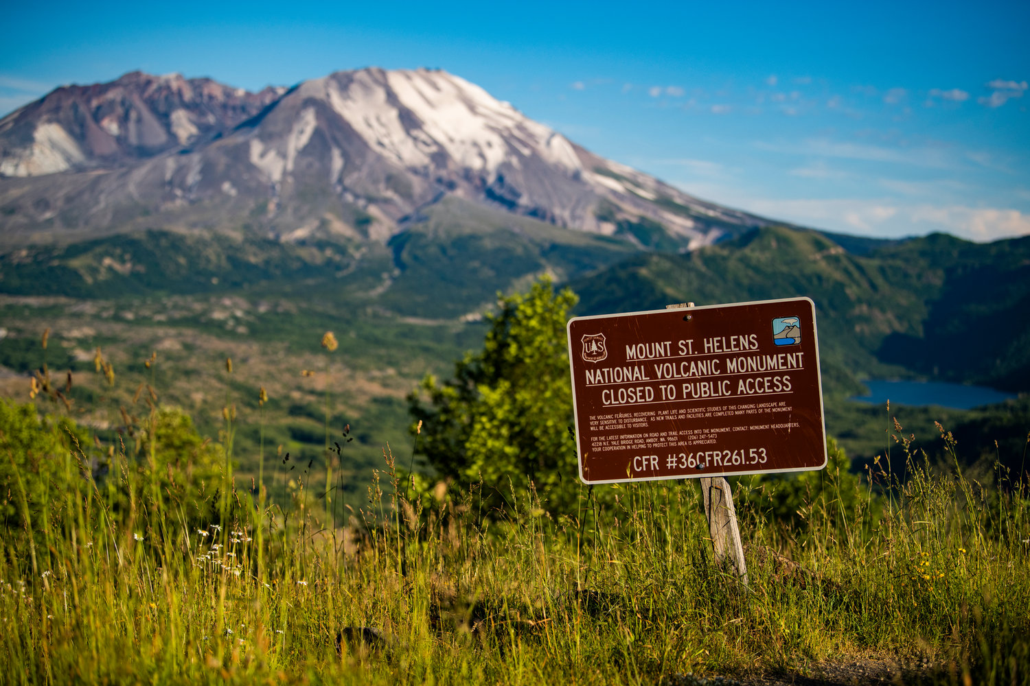 Signage is displayed near the Mount St. Helens National Volcanic Monument on Tuesday, July 12, 2022.