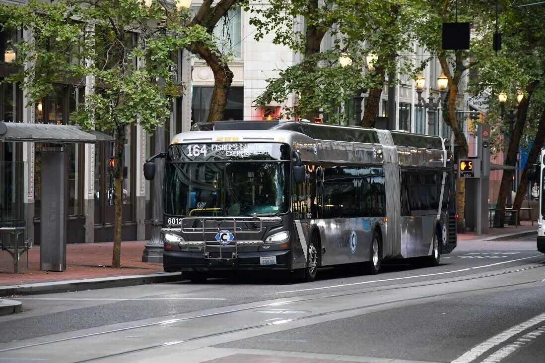 A C-Tran bus rides down a street in Vancouver.