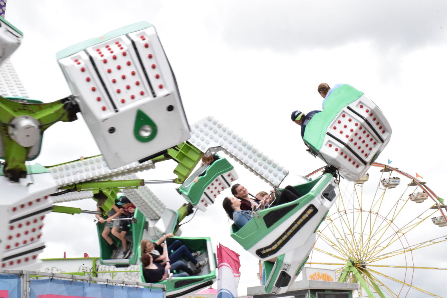 Fairgoers take a spin on one of many thrill rides on opening day of the 2018 Clark County Fair.