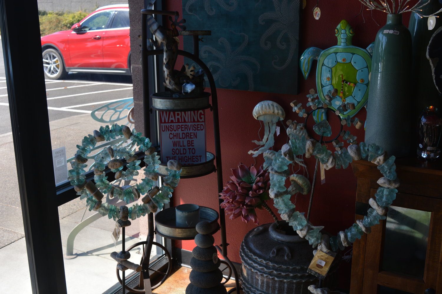 Decorative items made of recycled glass from Indonesia are displayed at Rare Earth Decor in Ridgefield on Aug. 24.