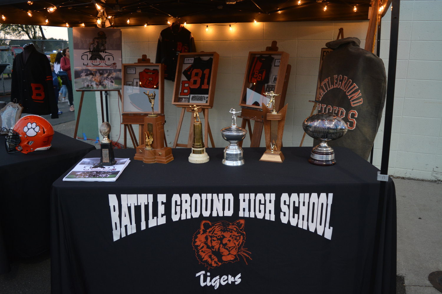 A table displays memorabilia of the Battle Ground High School Tigers prior to a football game which marked 100 years of the sport at the high school on Sept. 30.