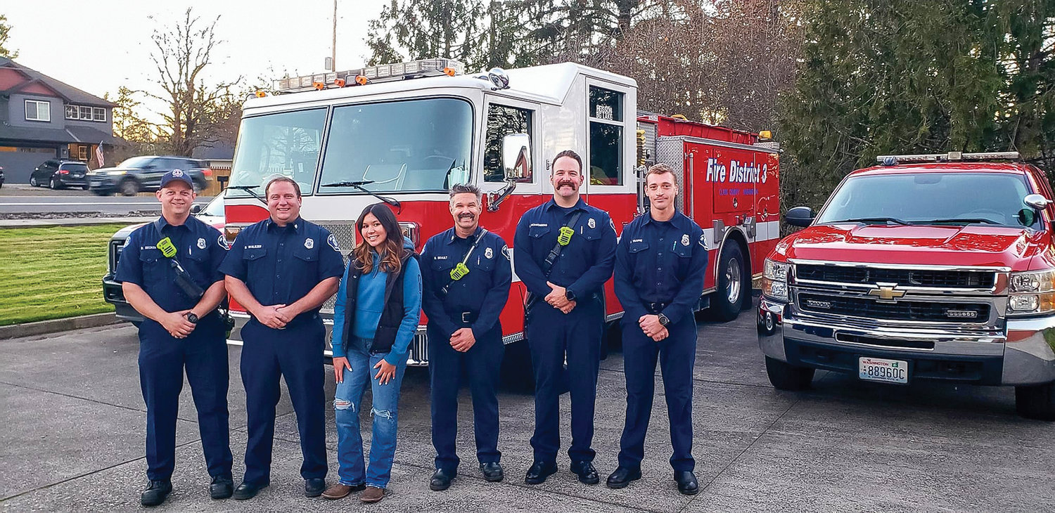 McKenna is pictured with firefighter and paramedic Jerik Traffie, Captain Brian Brault, captain and paramedic Dustin Waliezer, AMR paramedic Shawn Brinkley, firefighter and paramedic Remington Becker and firefighter Branden Nohrenberg.