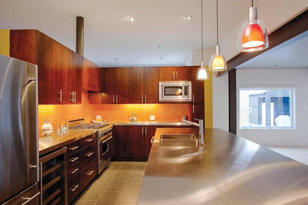 Installing uplighting beneath kitchen cabinets is an inexpensive way to give a kitchen a new look.