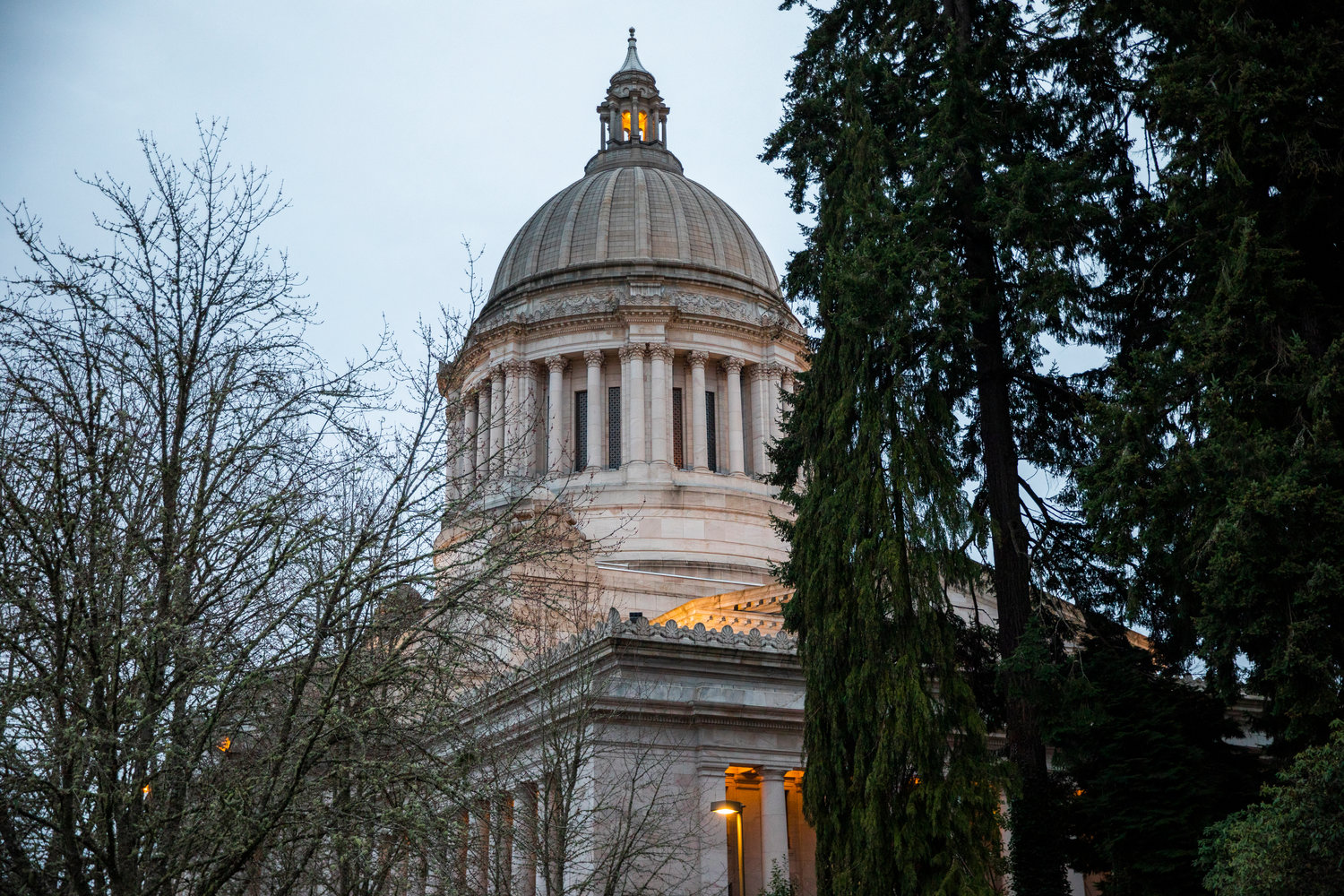 The Capitol building in Olympia, home to the Senate and House chambers, is seen from outside the Governor’s Mansion Thursday, Feb. 16.