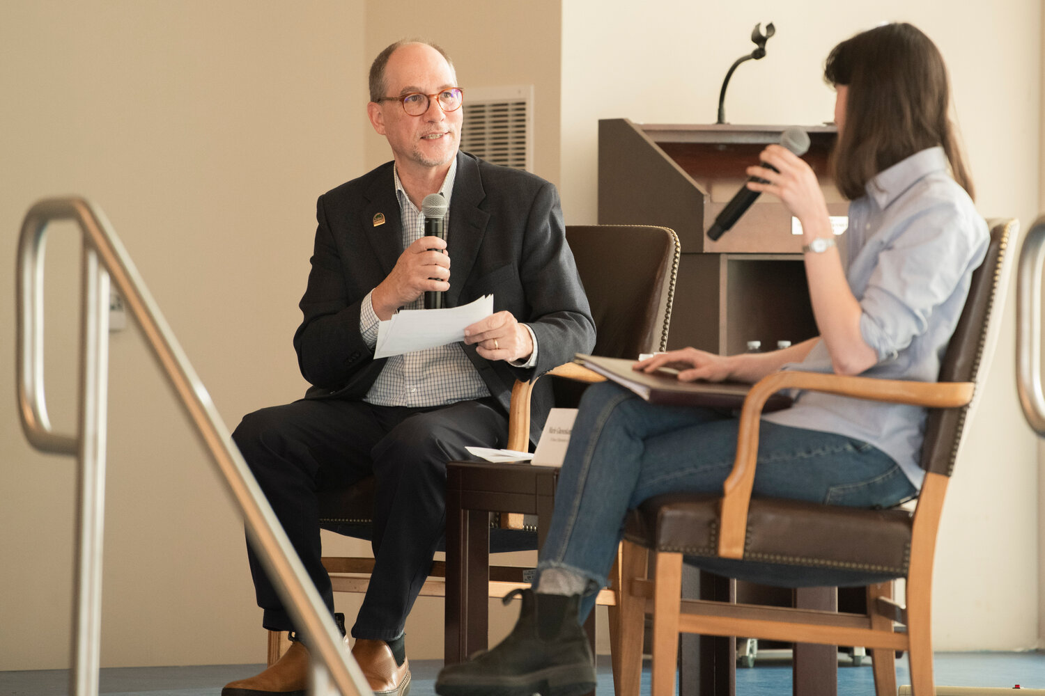 Centralia College President Bob Mohrbacher introduces Congresswoman Marie Gluesenkamp Perez during a town hall at the TransAlta Commons in Centralia on Wednesday, May 3.