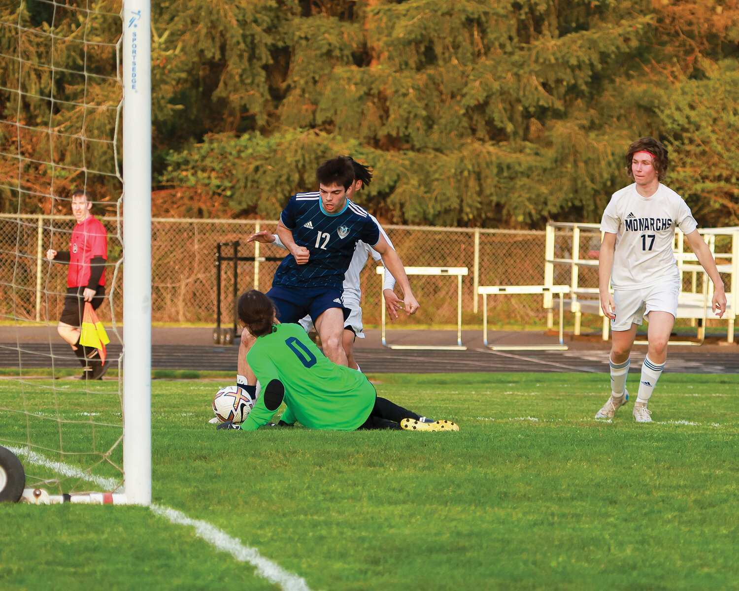 Hockinson's John Charles gets past the keeper for his first of two goals during the team's 7-0 victory over Mark Morris on Tuesday, May 2.