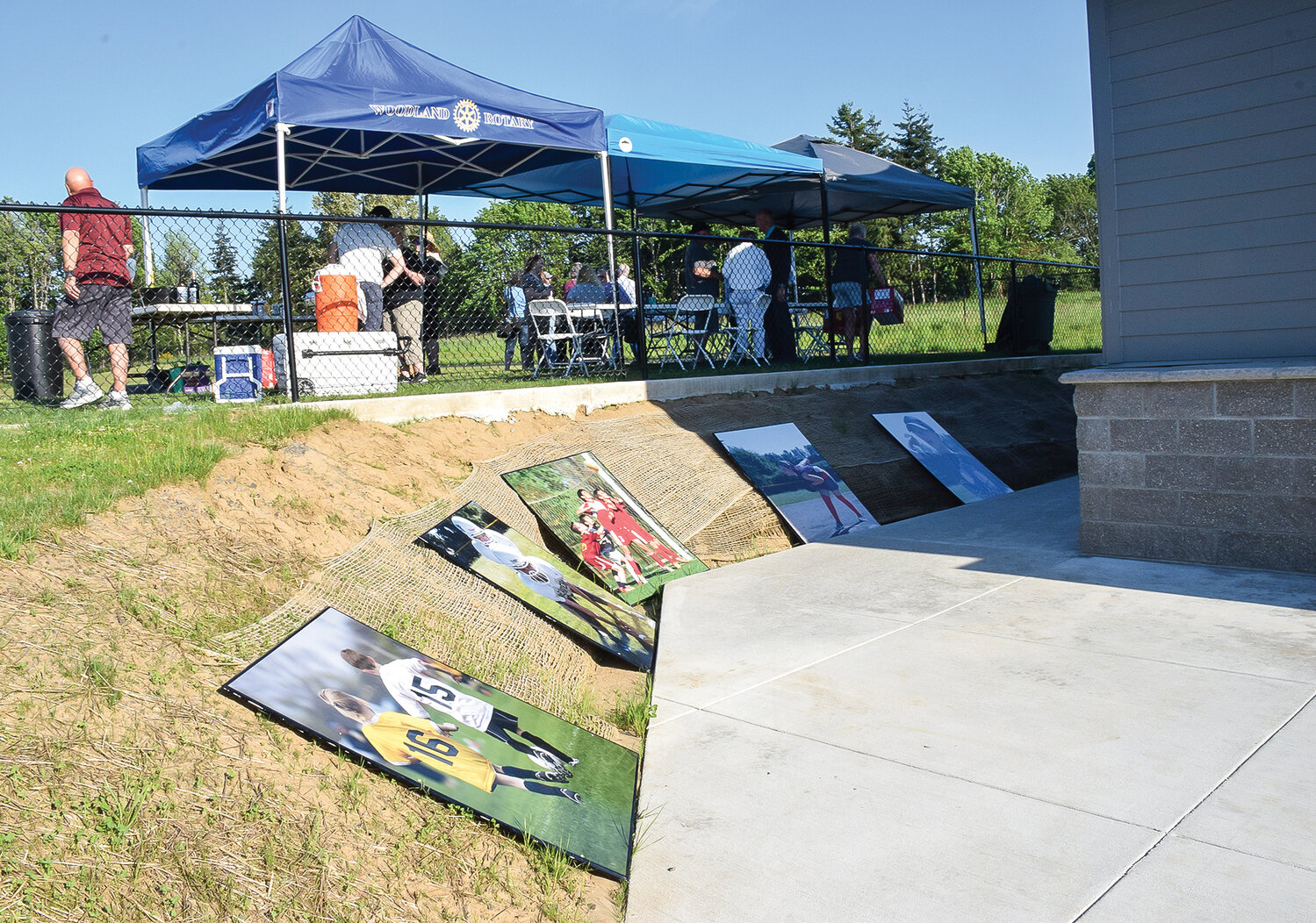 Photos of potential sports at future Scott Hill Park fields in Woodland are displayed during an open house at the existing park on May 18.