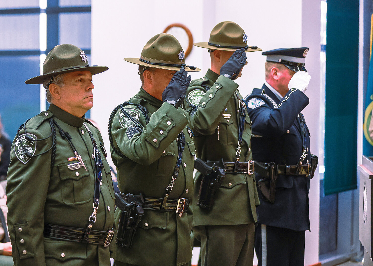 Members of the Clark County Sheriff's Office Honor Guard salute the bell ringers during the bell ceremony of the Clark County Law Enforcement Memorial Ceremony on Thursday, May 18.