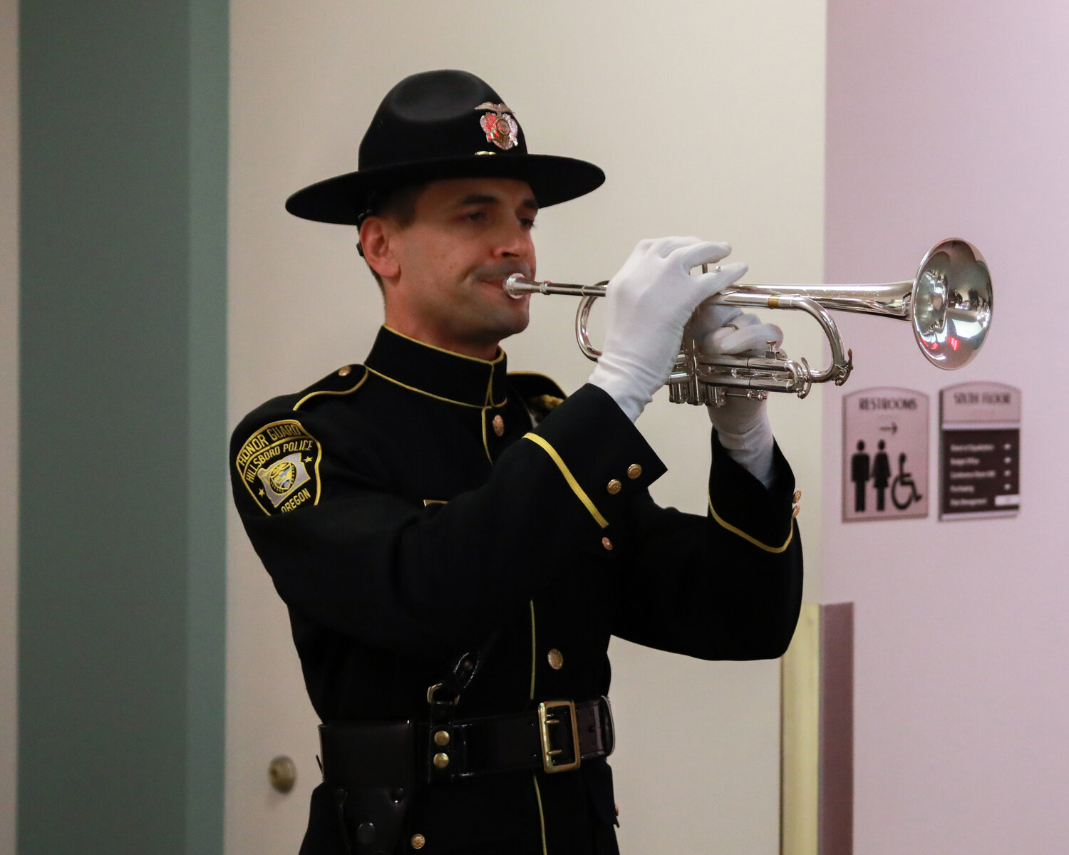 Sergeant Leland Gilbert, of the Hillsboro Police Department, plays taps during the Clark County Law Enforcement Memorial Ceremony on Thursday, May 18.