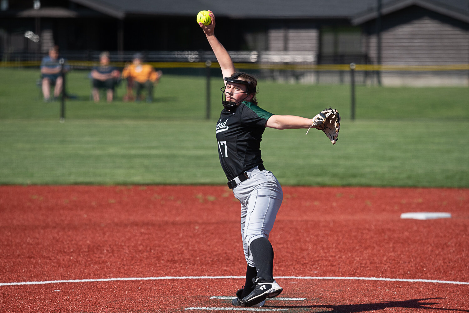 Addi Christensen throws a pitch during Woodland's 4-3 loss to Tumwater in the quarterfinals of the 2A District 4 tournament on May 18 at Rec Park in Chehalis.
