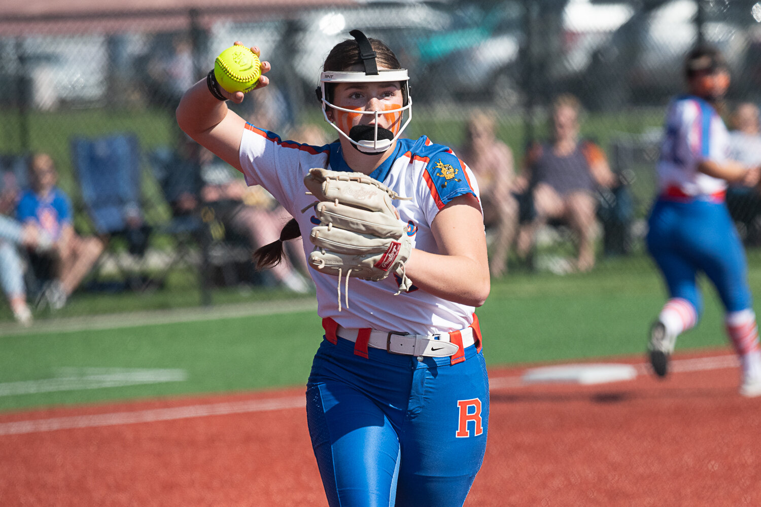 Ridgefield's Elizabeth Peery throws to first during the Spudders' 7-5 win over W.F. West in the quarterfinals of the 2A District 4 tournament on May 18 at Rec Park in Chehalis.