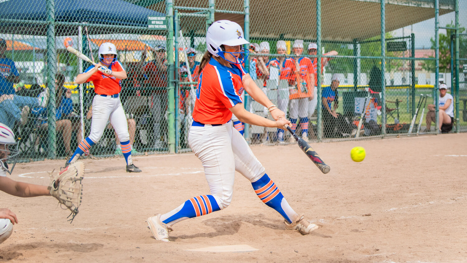 Ridgefield’s Makayla Ferguson (13) puts her bat on the ball during a state title game against North Kitsap at Carlon Park in Selah on Saturday, May 27.