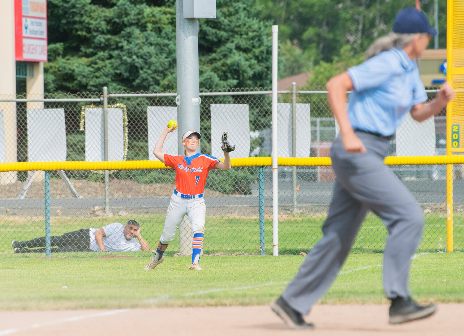 Ridgefield’s Charlie Harris (7) throws a ball in from the outfield during a state title game against North Kitsap at Carlon Park in Selah on Saturday, May 27.