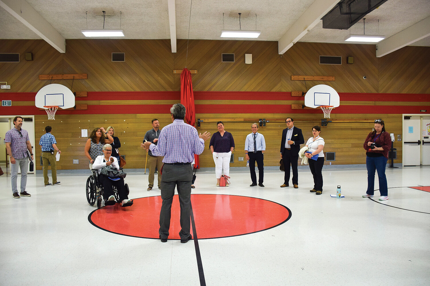 Glenwood Heights Primary School Principal Antonio Lopez speaks to community members who attended the “Discover BGPS” tour in the school’s gym on May 25.