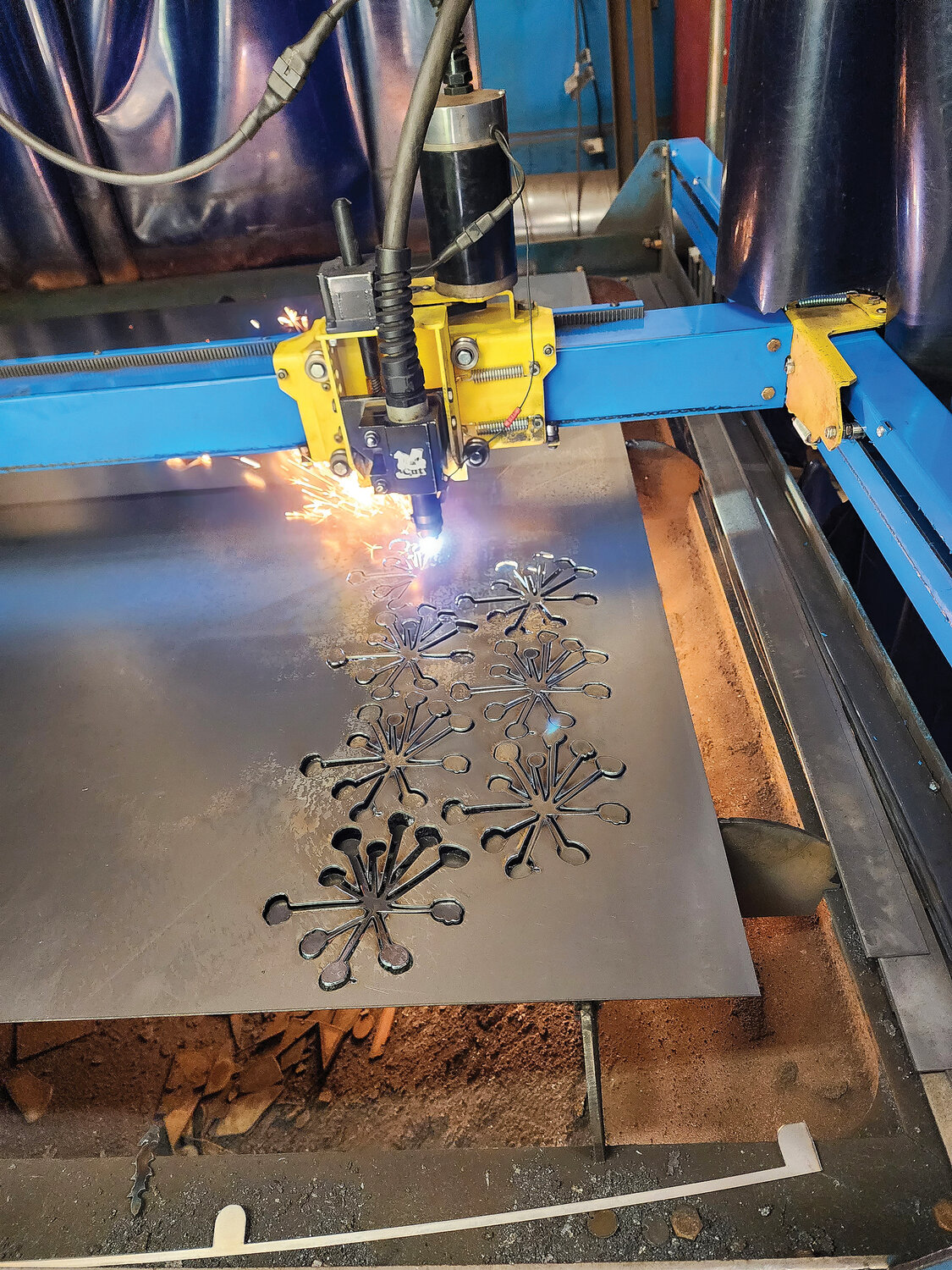 The CNC plasma table creates a design by Metal Art Fever on Friday, May 26.