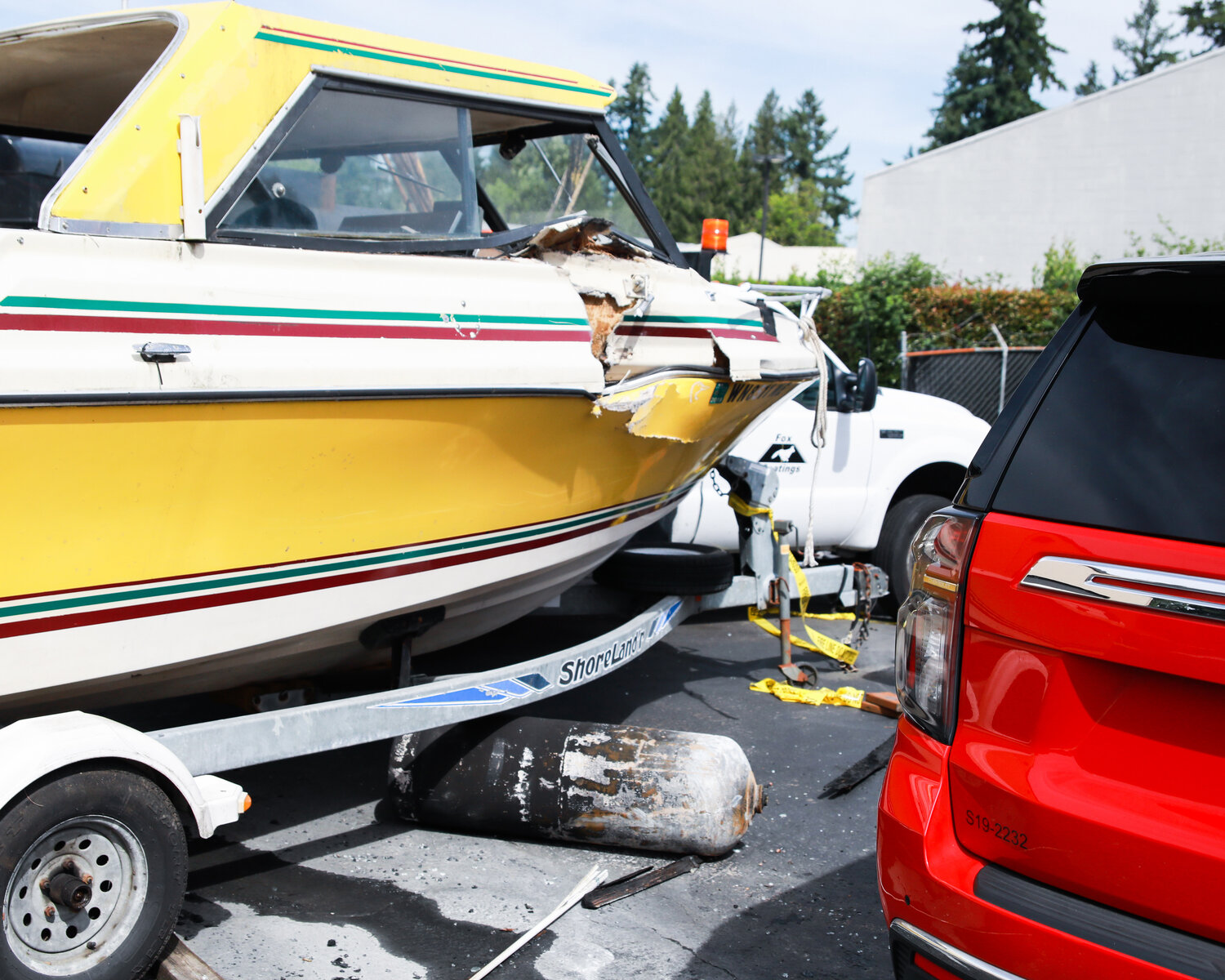 Canisters were sent flying during an industrial building fire that started on Tuesday, June 6, in Salmon Creek, damaging a boat.