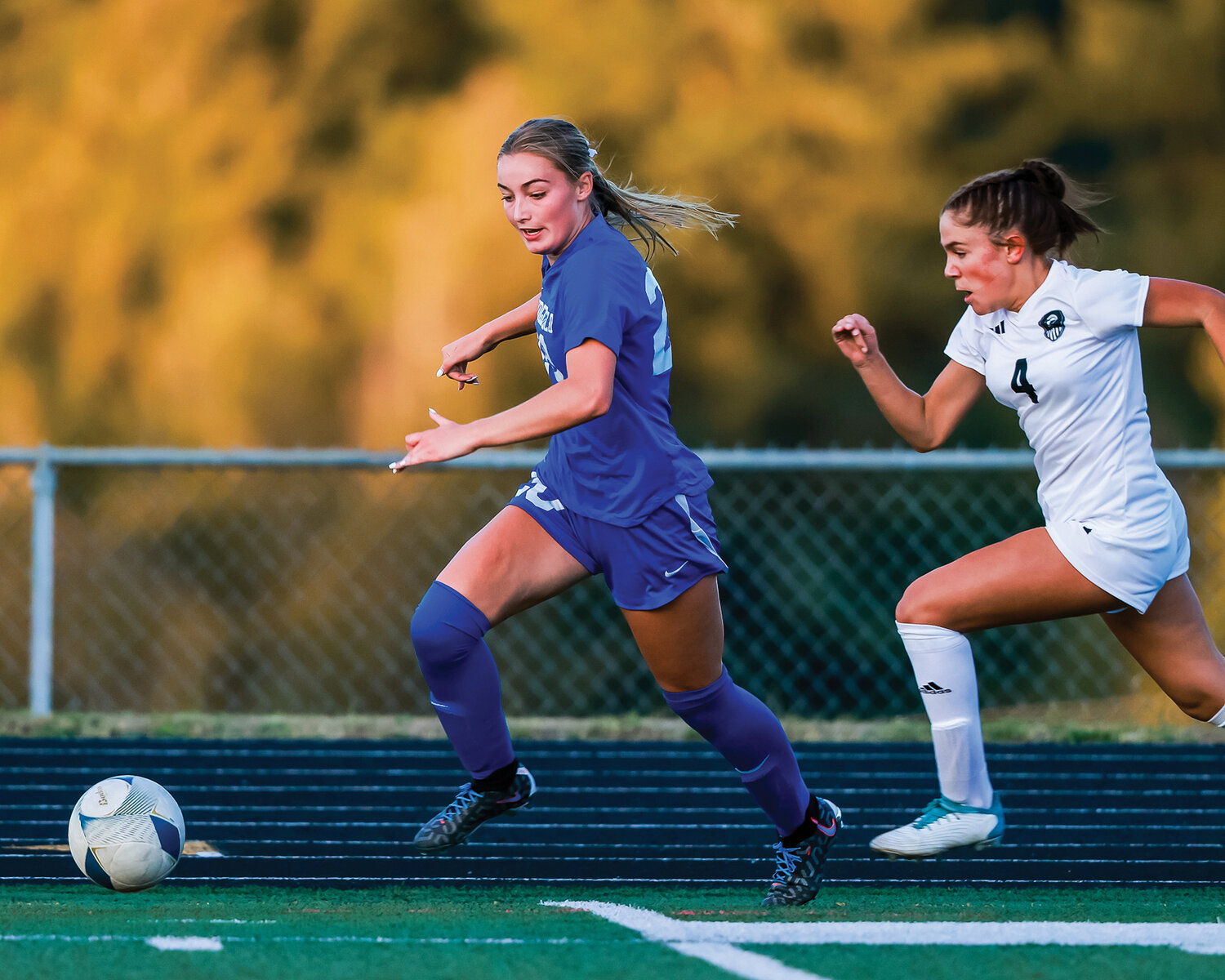 Ridgefield’s Baylee Bushnell passes a Union defender on the offensive side of the field early in their 2-0 non-league victory on Thursday, Sept. 7.