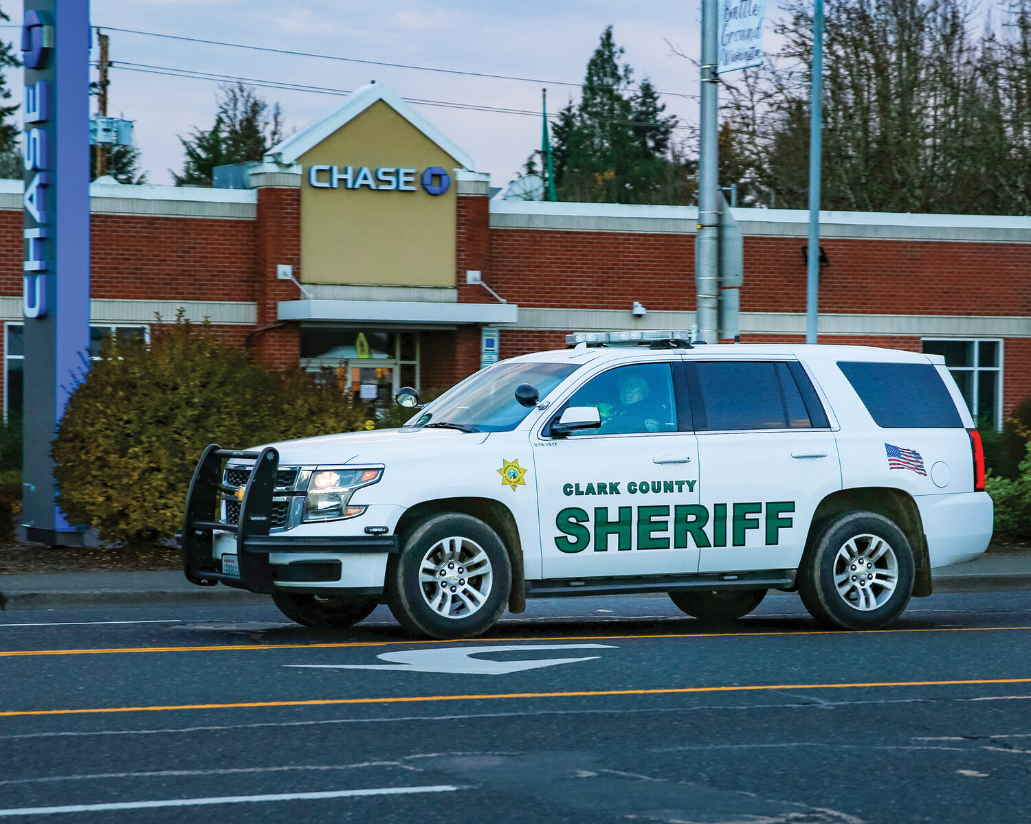 A Clark County Sheriff’s Office vehicle drives down Main Street in Battle Ground.
