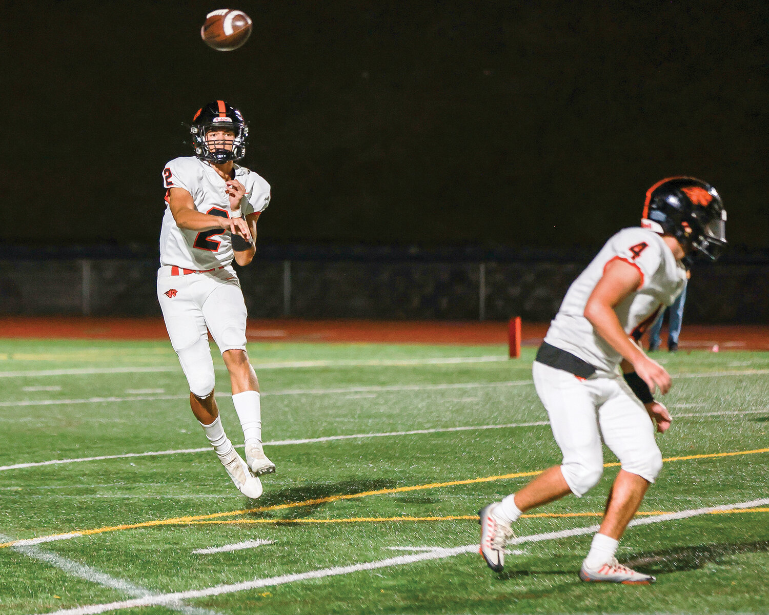 Battle Ground quarterback Ethan Adams throws a pass during the Tigers’ 48-30 league win over Union High School on Thursday, Oct. 12.