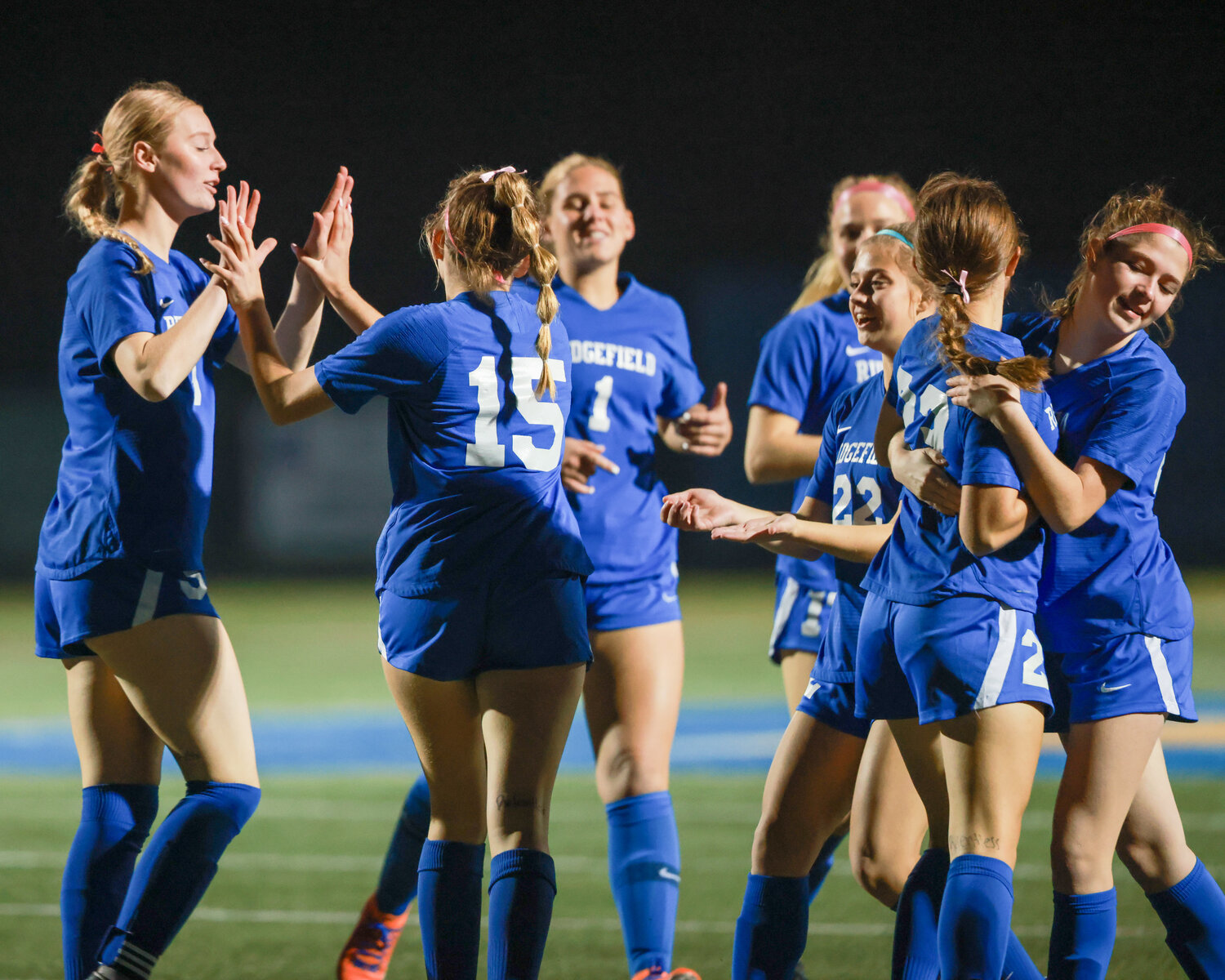 The Spudders celebrate a goal scored by Victoria Lasch, No. 15, during the Spudders’ 2-0 opening round win against the Aberdeen Bobcats on Tuesday, Oct. 31.