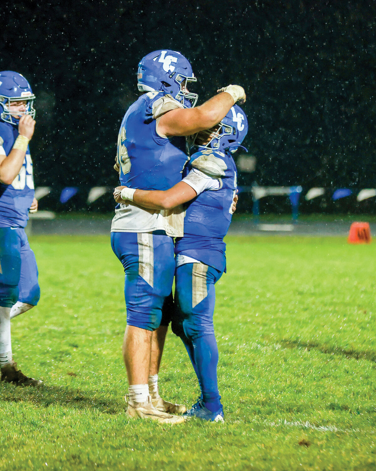 Wildcat seniors Ryan Kawalek, left, and Jalen Ward embrace each other after their season-ending, 21-7 loss to the Omak Pioneers on Friday, Nov. 10.