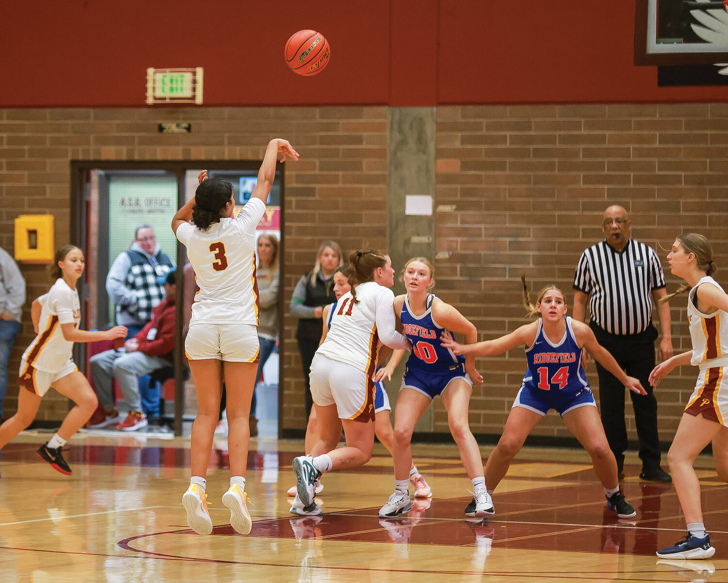 Prairie's Harmony Fallin attempts a three during a season-opening 47-39 loss to the Spudders on Wednesday, Nov. 29.